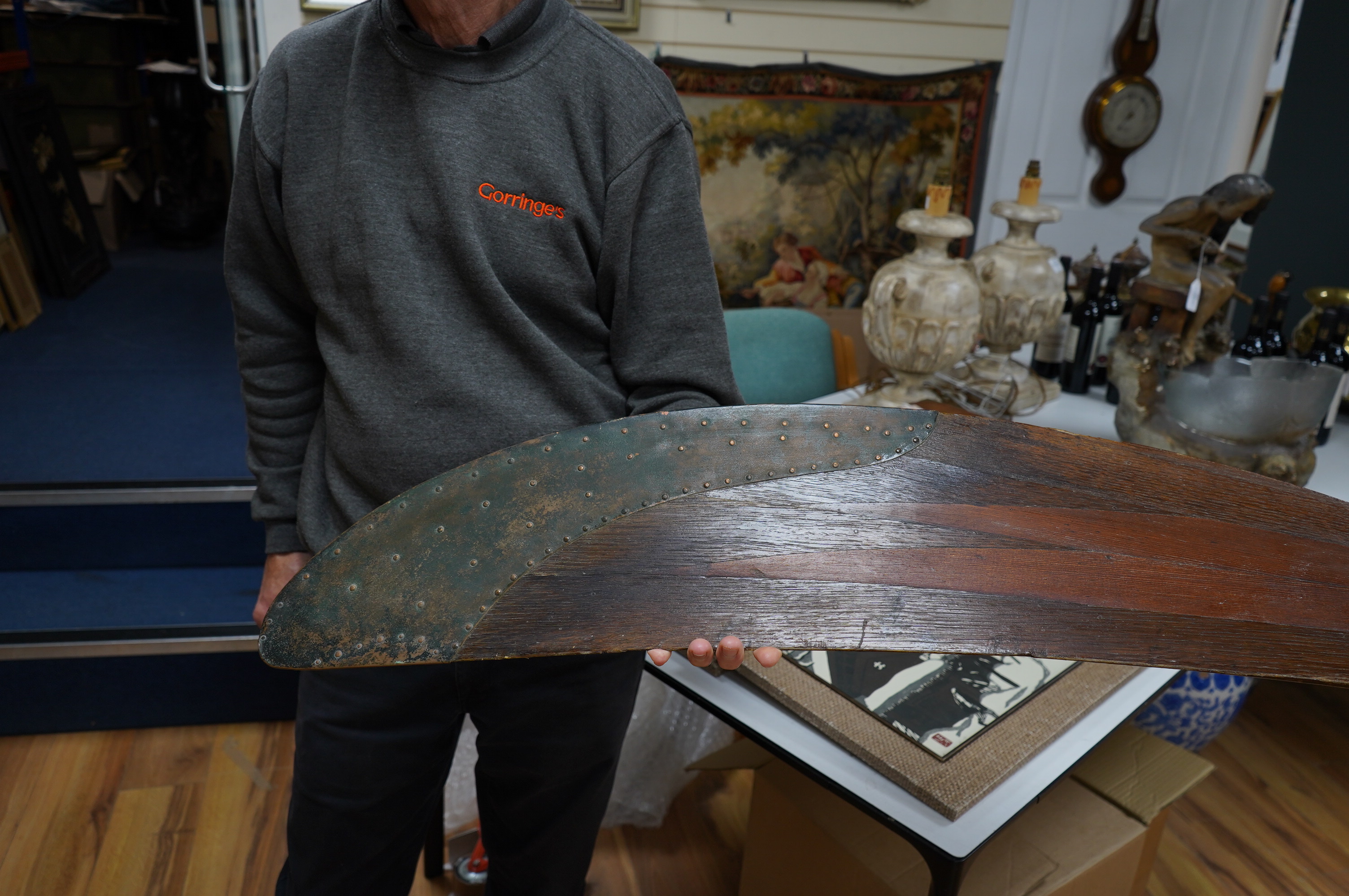 An early 20th century American laminated oak propeller with copper clad blade edges, Paragon stamp to the blade, 251cm wide. Condition - good